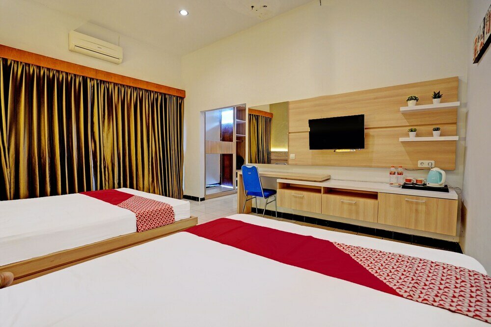 Фото Capital O 92162 Hotel Wisata Karya