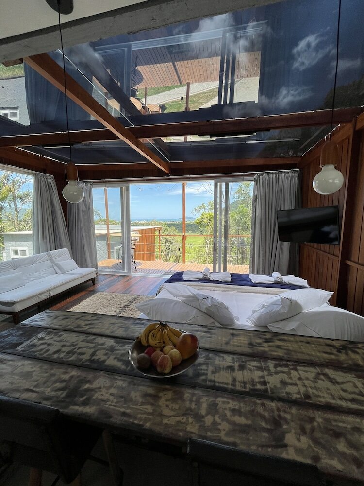 Фото Casa de Vidro - Hospedar com Propósito