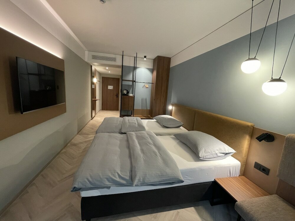 Фото Stadthotel Neumarkt Mitte