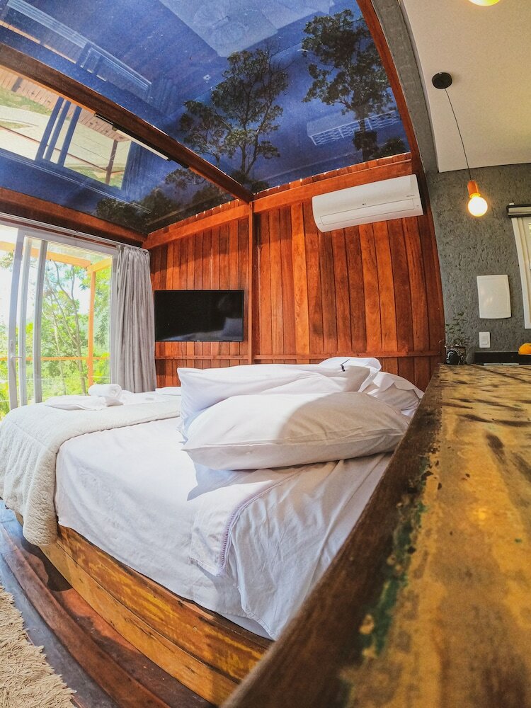 Фото Casa de Vidro - Hospedar com Propósito