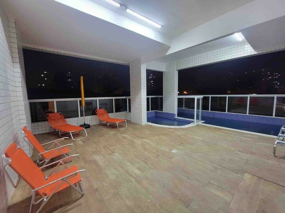 Фото Lindo apto com piscina em Praia Grande