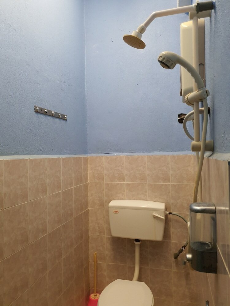 Фото Spot On 89920 Muwaffaq Inn