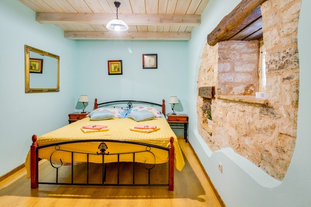 Фото Especially charm stone house with a pool