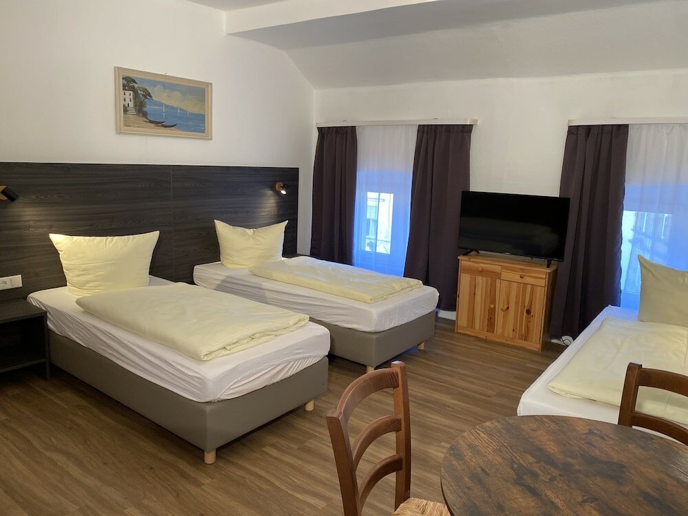 Фото Ferienwohnungen Neumann