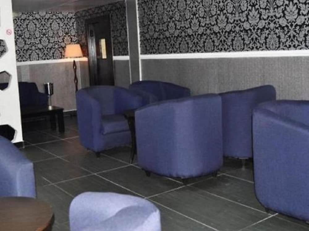 Фото De Brass Suites Hotel