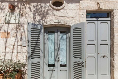 Внешний вид отеля Antico Mondo Rooms & Suites в Полиньяно-а-Маре, фото 5