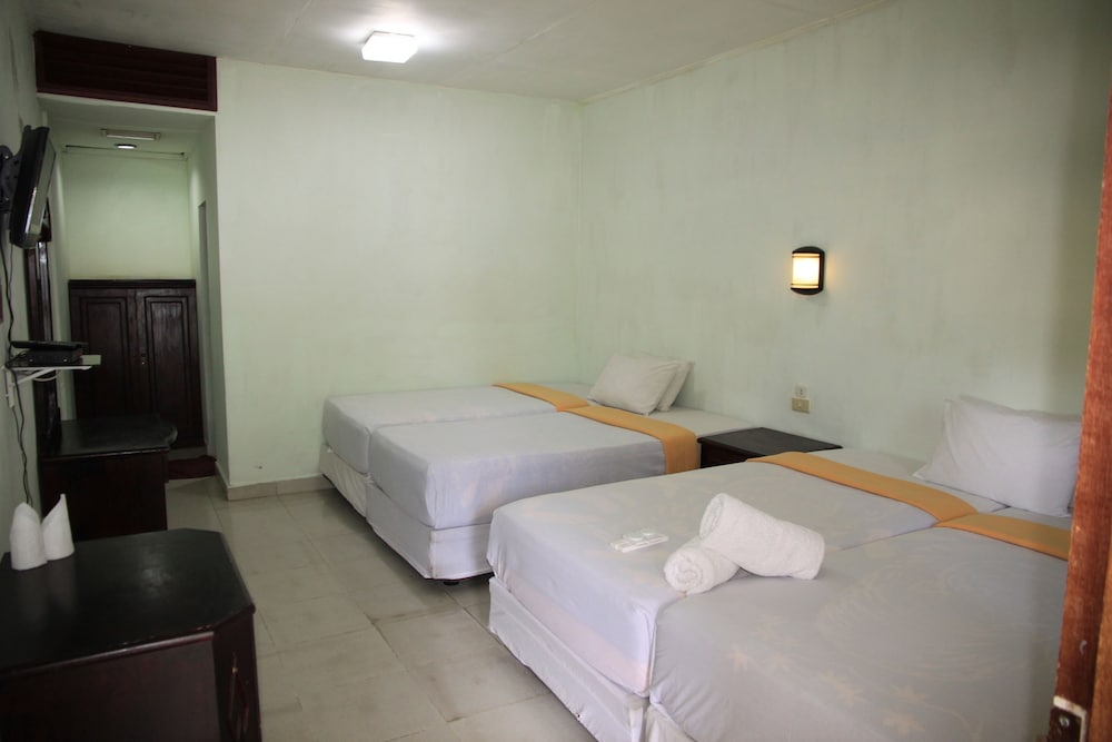 Фото Pandu Lakeside Hotel Parapat - Toba Lake