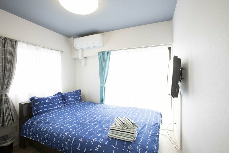 Гостиница Suginami Koenji Apartment в Токио