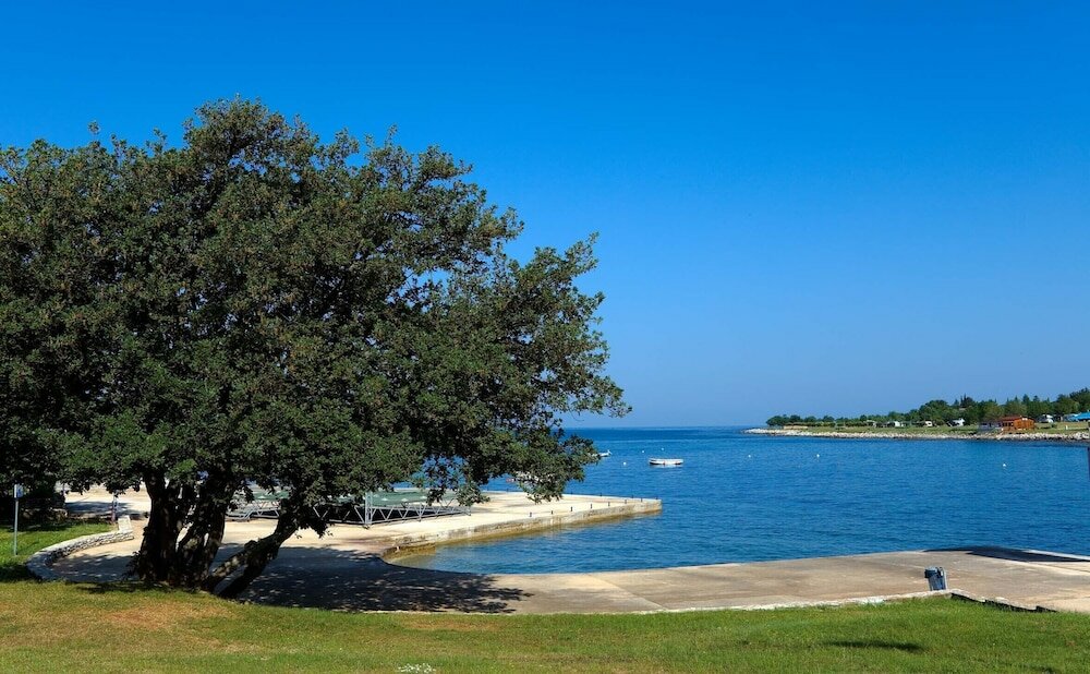 Фото Mediteran Mobile Homes Camping Park Umag