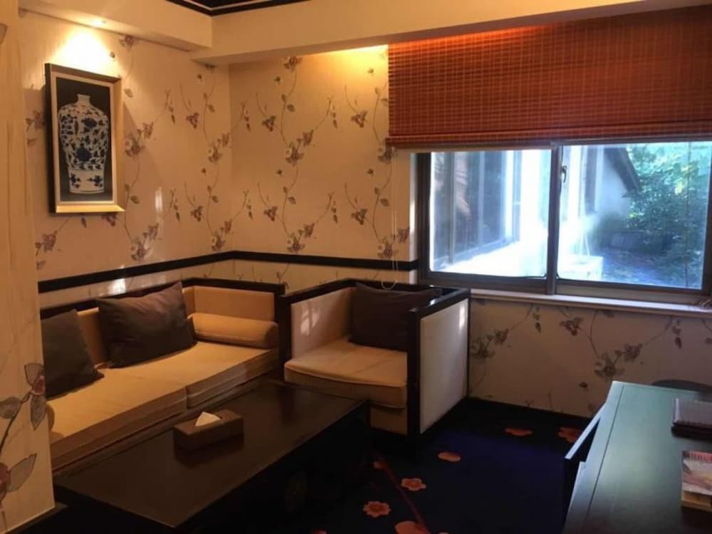 Фото Qiao Garden Vacation Hotel