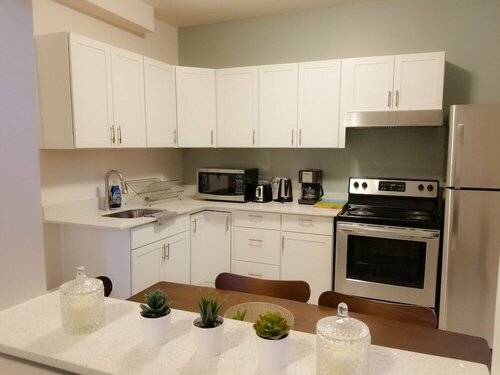 Гостиница JstLikeHome - Downtown Suites в Оттаве
