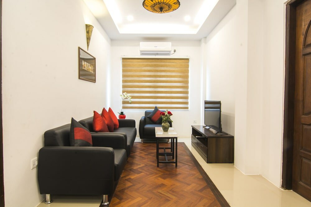 Фото Woodside Inn & Serviced Apartments