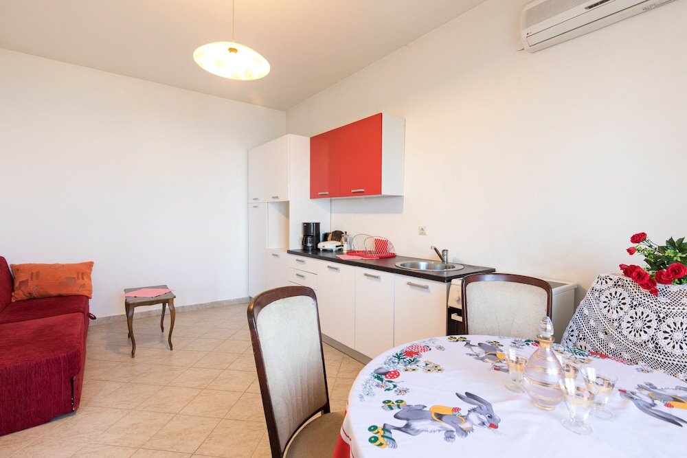 Фото Apartment Lucia & Holiday Home Nino