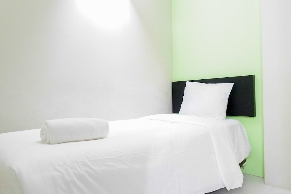 Фото Minimalist 2br at Dian Regency by Travelio