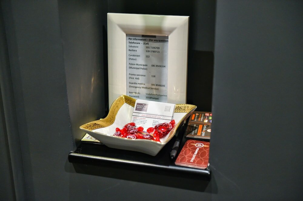 Фото Pompei Inn Ruins Luxury Suites