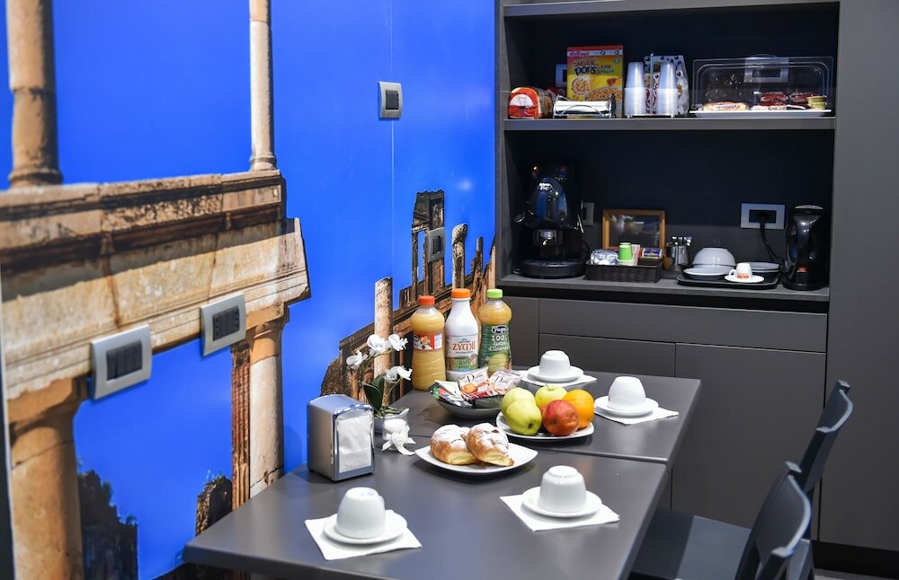 Фото Pompei Inn Ruins Luxury Suites