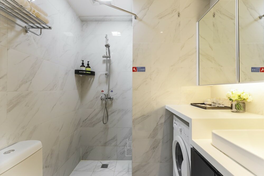 Фото Yue Qi Hotel Apartment