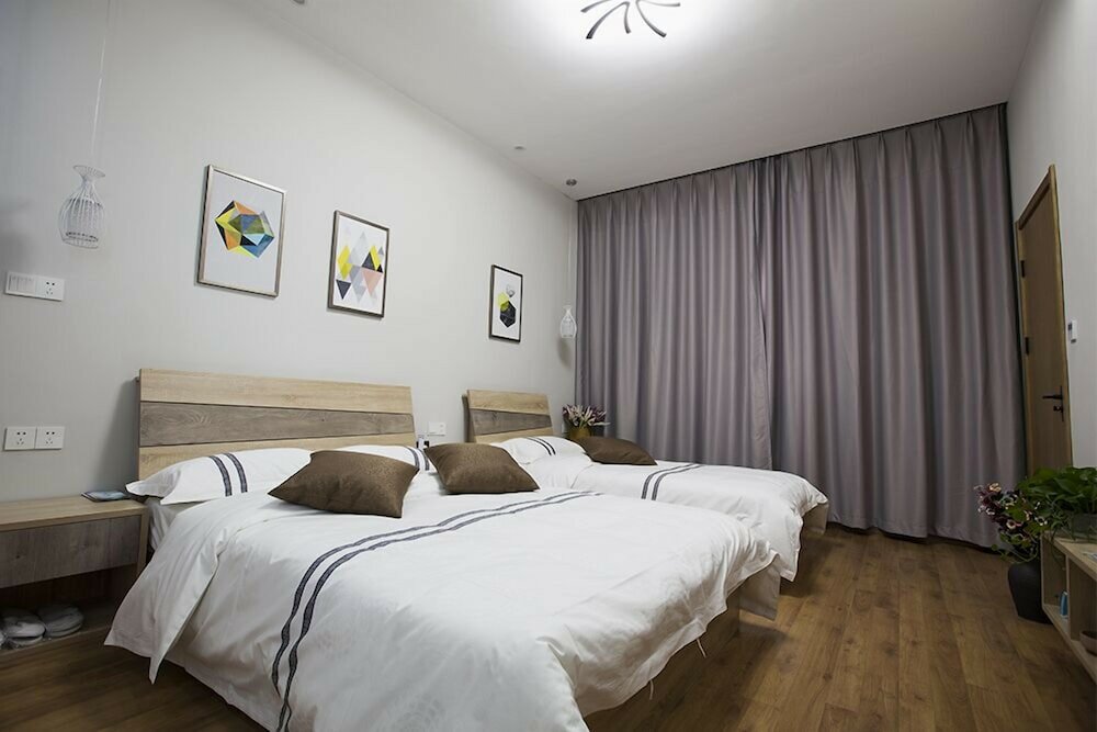 Фото Floral Hotel Nanjing Zuolingyoushe