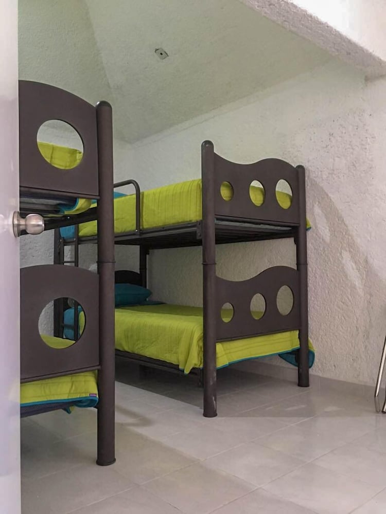 Фото Pok-Ta-Pok Guest House