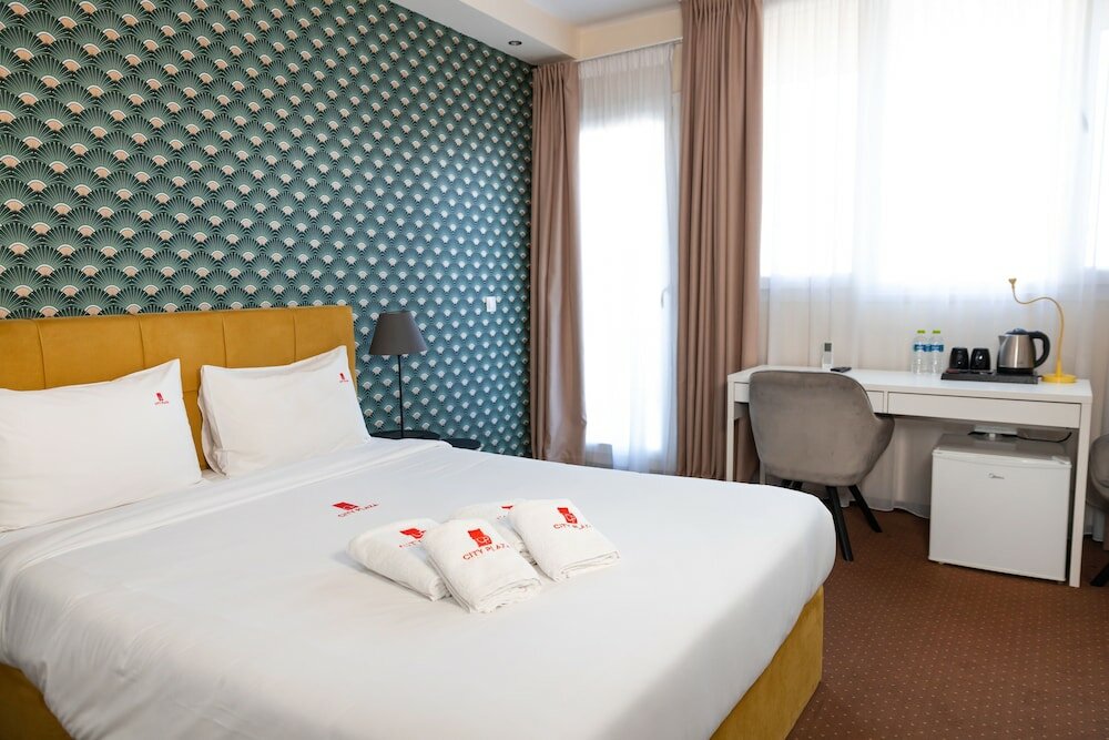 Фото City Plaza Apartments & Rooms