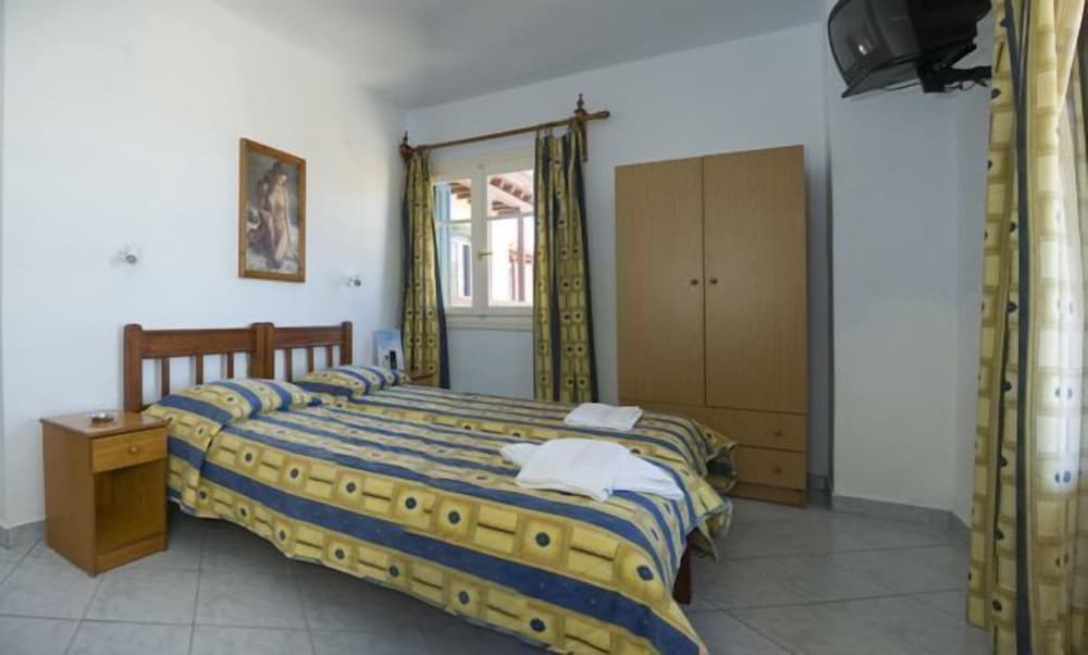 Фото Alexandros Rooms & Studios