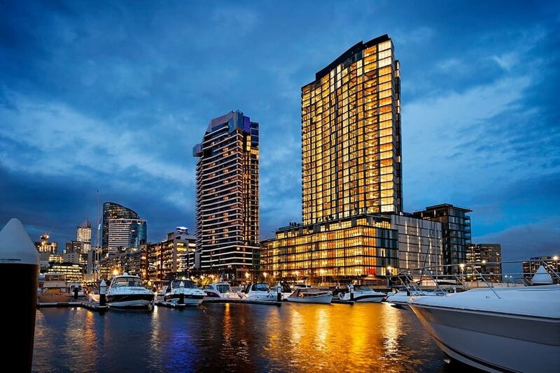 Гостиница Melbourne Docklands Concavo Seaview Apartment в Мельбурне