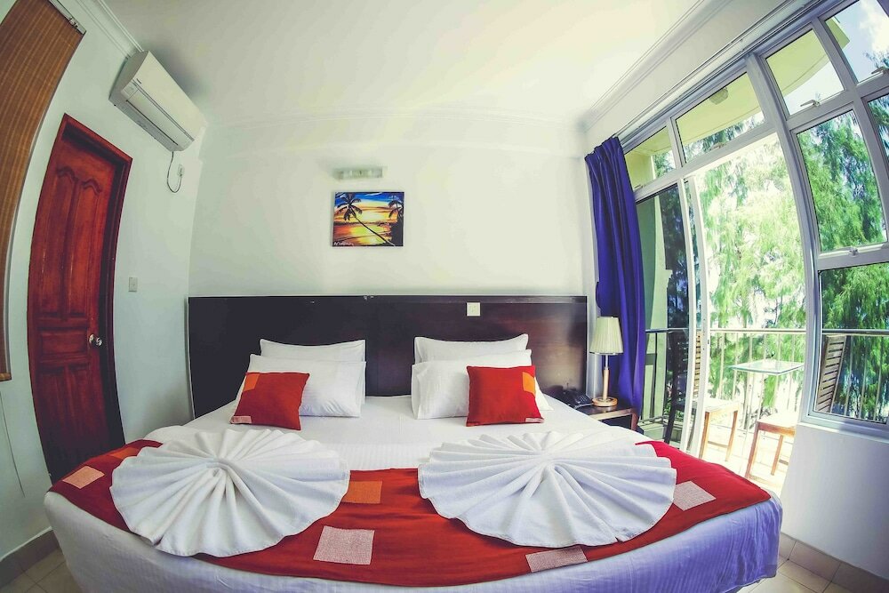 Фото Sunny Suites Inn