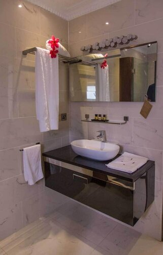 Гостиница Red Mango Apartment Hotel в Такоради