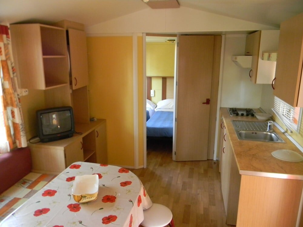 Фото Happy Camp in Camping Villaggio Thurium