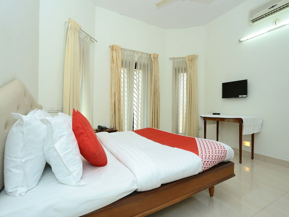 Фото Oyo 11528 Kovlam Park