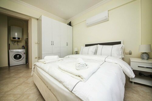 Апартаменты Sleek Flat With Private Beach and View in Milas в Миласе
