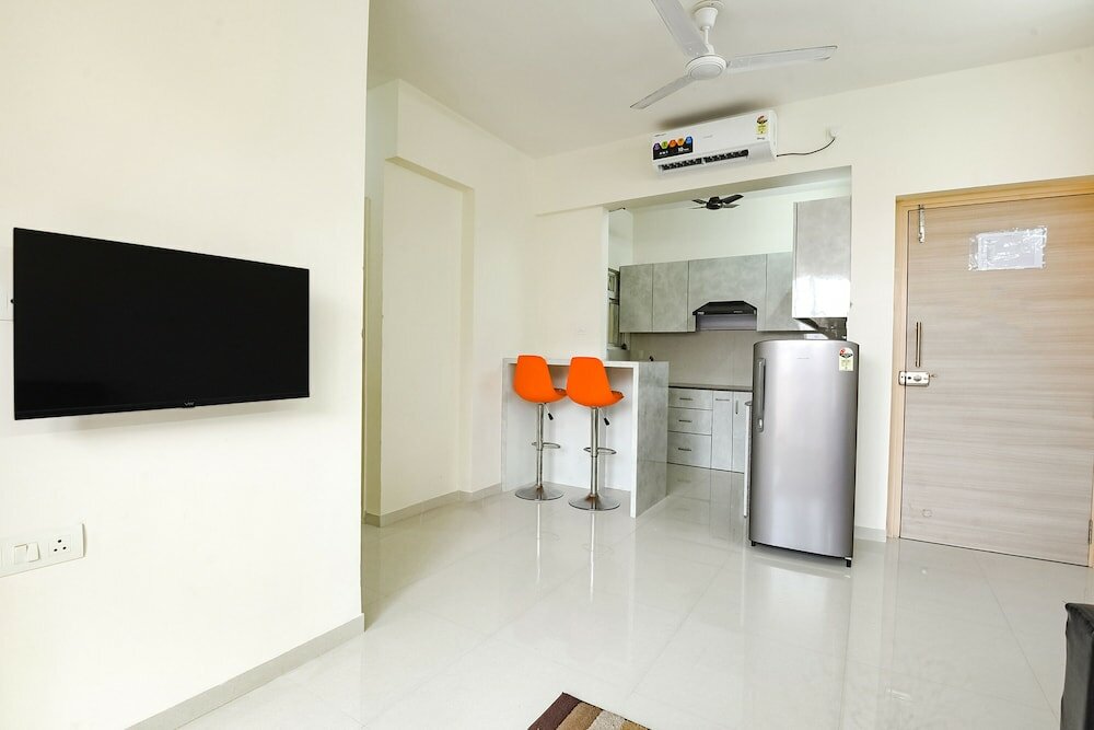 Фото Fabhotel Prime Santoshi Holiday Homes