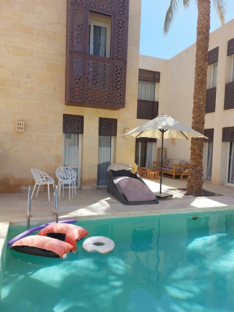 Фото Nayah boutique Stays