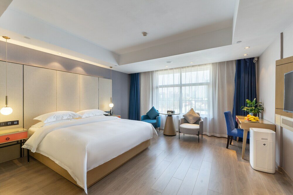 Фото Yì Wū Shì Bó Yì Měi Jū Hotel