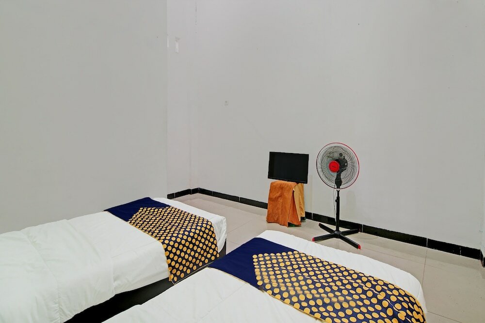 Фото Spot On 92536 Teguh Homestay Syariah