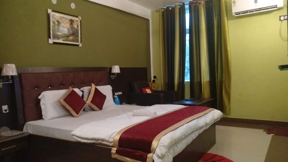 Фото Hotel Zero Mile Rooms