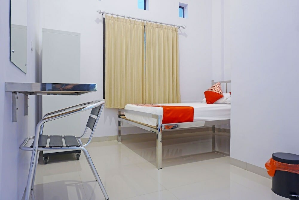 Фото Oyo 3123 Orchid Homestay Syariah