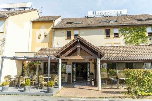 Гостиница Hotel Bagatelle, Paris Nord Roissy в Сарселе