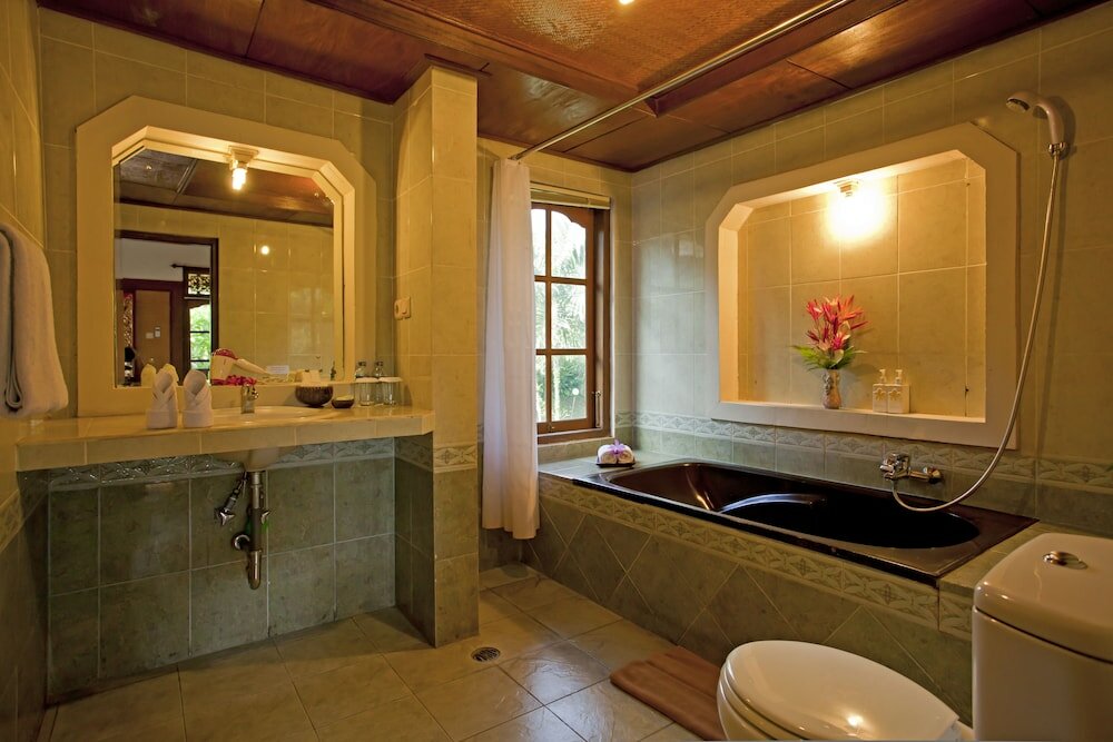 Фото Artini Cottages 1