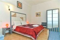 Фото B&t Rooms Trani