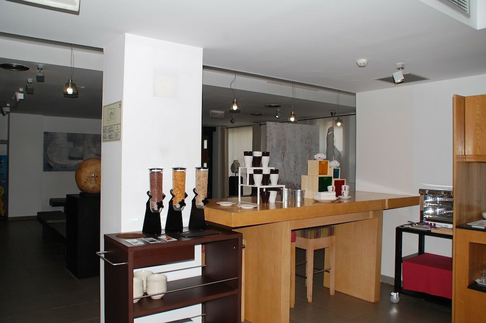 Фото Eco Alcala Suites