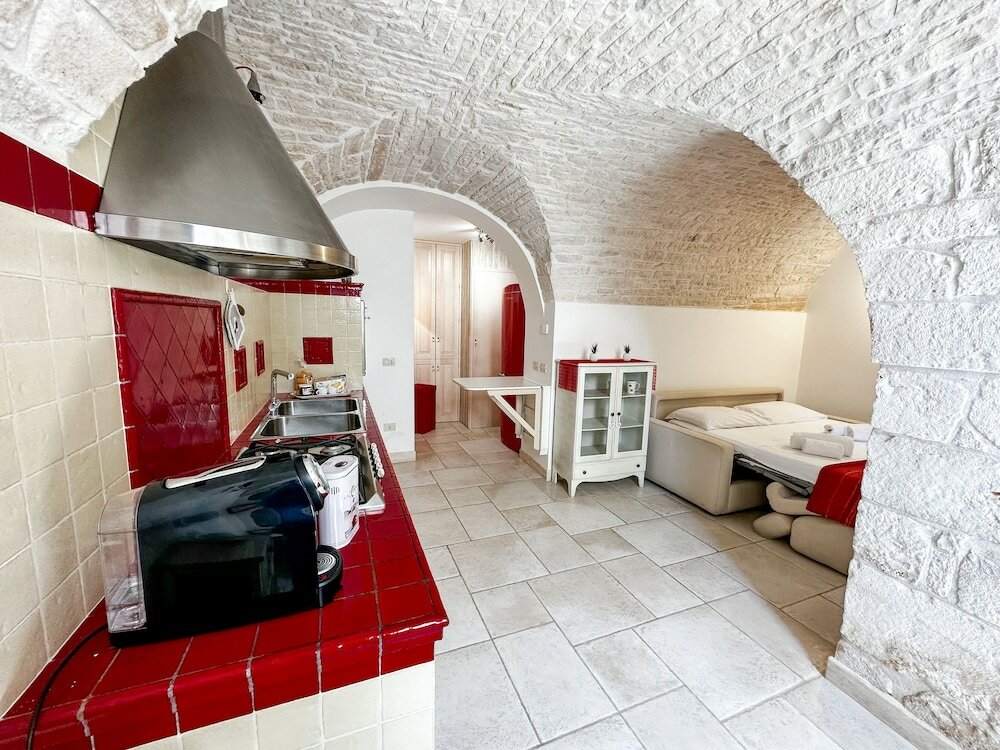 Фото Trulli Contento Rooms E Apartments