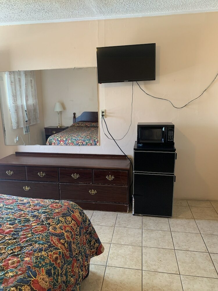 Фото Loma Alta Motel