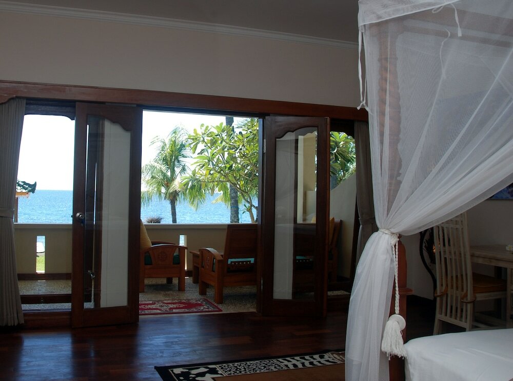 Фото Poinciana Resort Bali