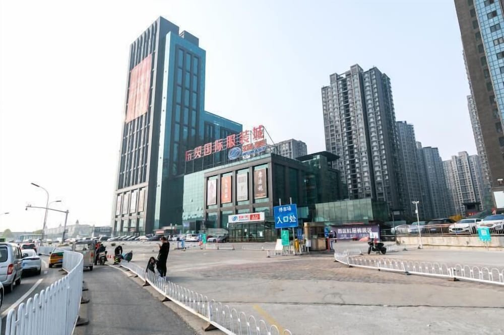 Фото Xiwangju Apart-hotel