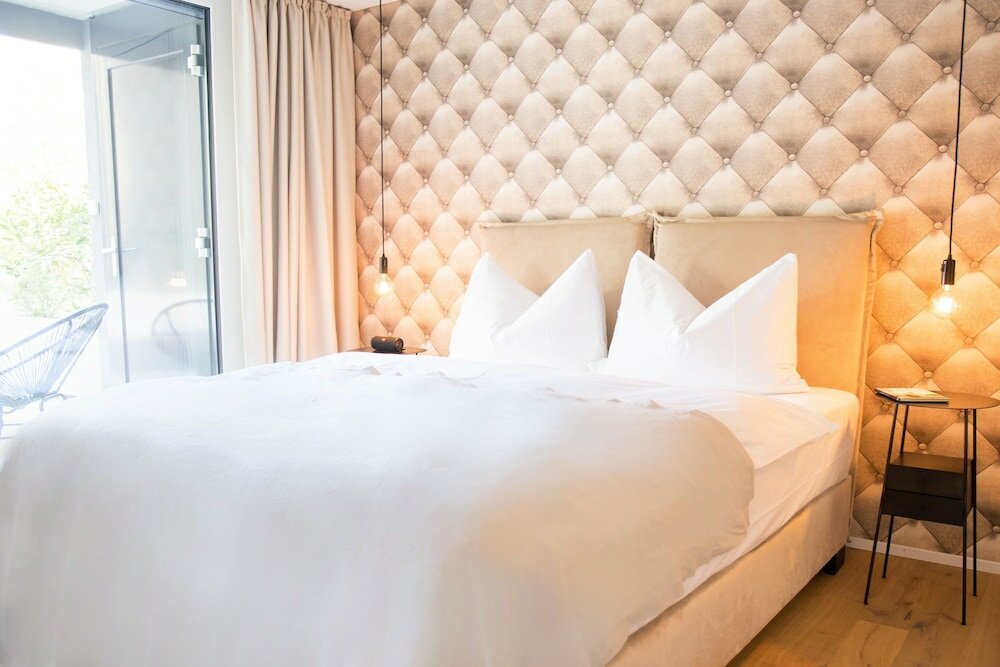 Фото Gubelhof Suites