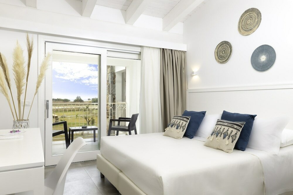 Фото Hotel S'Arena Beach