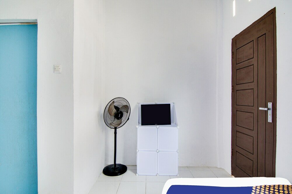 Фото Spot On 91858 Raja Homestay Syariah