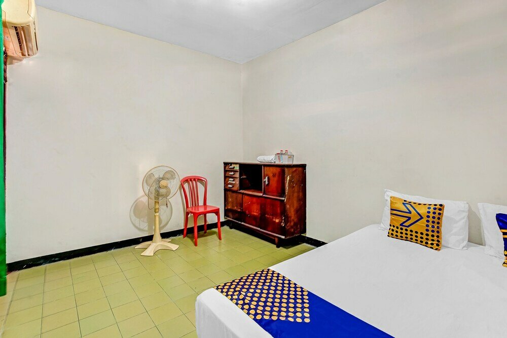 Фото Spot On 90098 Anak Mama Guesthouse