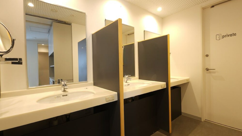 Фото Acro Capsule Hotel Namba Dotonbori